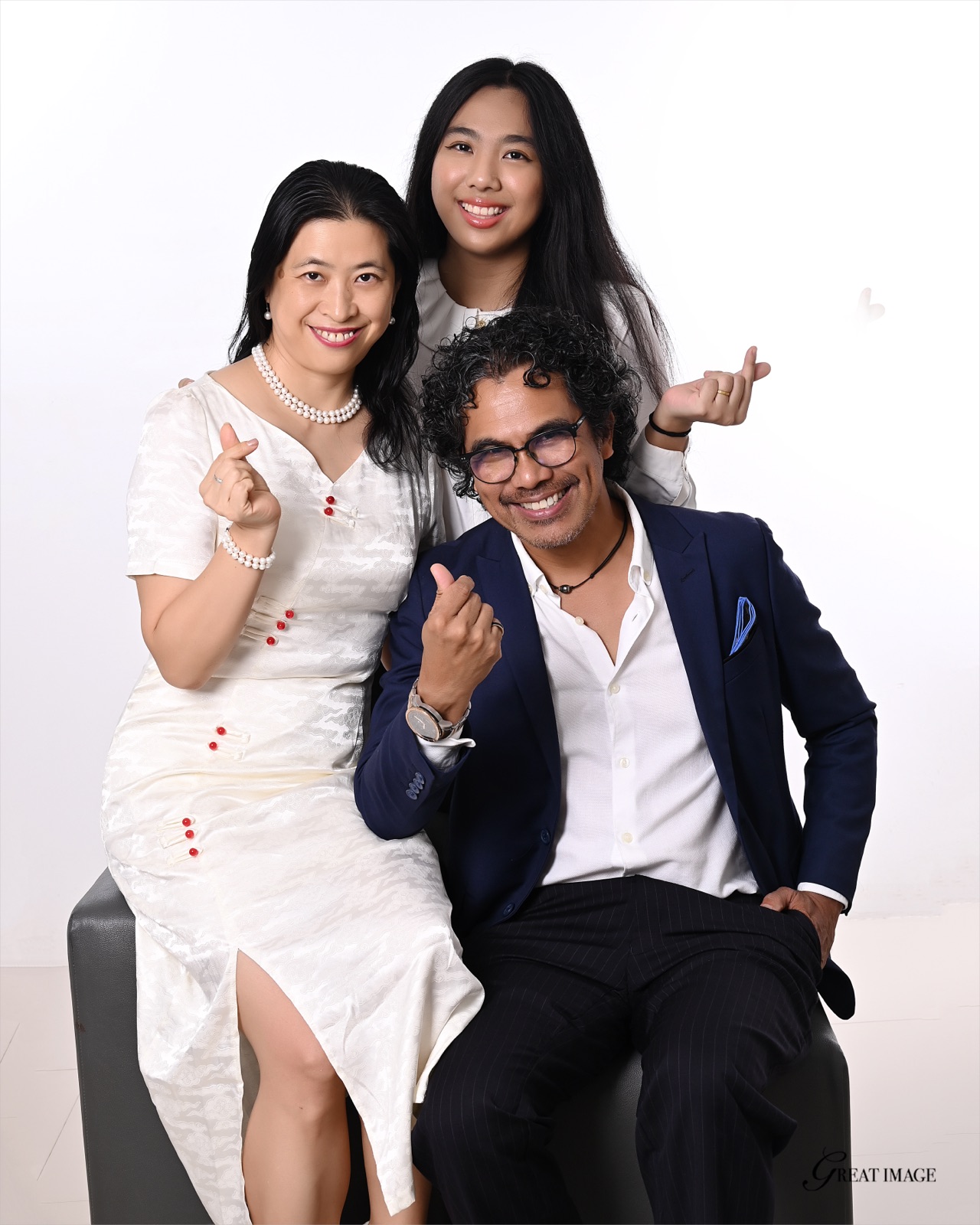 Julia, Ramil, and their daughter